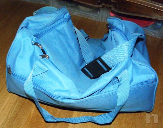 Valigia celeste a mano foto-11582