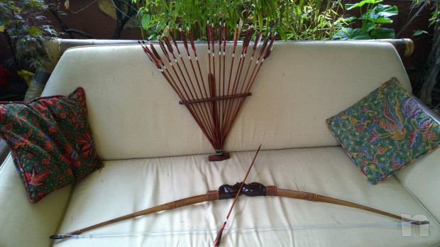 Arco con 20 frecce. foto-16867