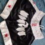 pantaloncini Thai Box, nero bianco stelle con scritta davanti